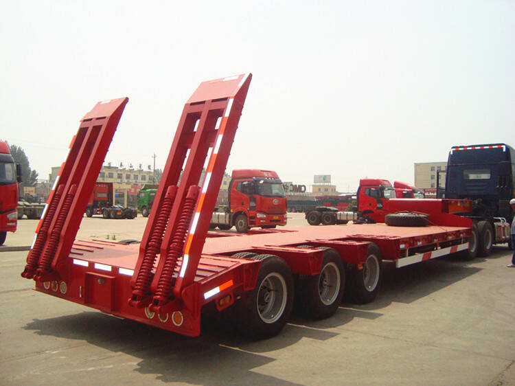 Tri Axle 60T Semi Low Loader Excavator Truck Trailer in Tanzania Mwanza
